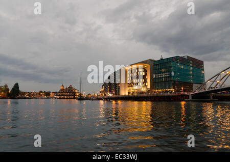 AMSTERDAM - OCTOBER 22, 2013: Canals on October 22, 2013 in Amsterdam. Amsterdam, capital of the Netherlands has more than one h Stock Photo
