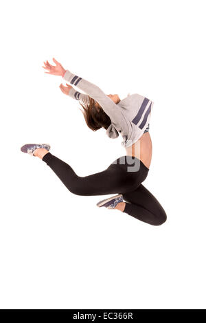 Girl jumping high isolated in white background Stock Photo