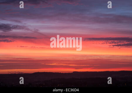 Hucknall, Nottinghamshire, UK. 9th December, 2014. Beautilful sunrise over the market town of Hucknall,Forecasters are say this could be the calm before the storm ,with strong winds and rain later this week . Credit:  IFIMAGE/Alamy Live News Stock Photo