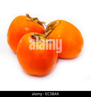 Persimon or Sharon fruit isolated on a white studio background. Stock Photo