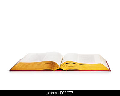 Open book with gold pages isolated on white background. Religion themes. Object with clipping path Stock Photo
