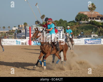 ALGECIRAS SPAIN -JULY 18 2014 First international beach polo tournament in Algeciras.Scene of the match Spain versus Uruguay. Stock Photo