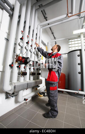 Heating engineers, maintenance, inspection Stock Photo