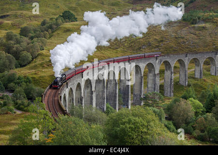 The Jacobite steam train on the Glenfinnan Viaduct, West Highland Line in Scotland. Stock Photo