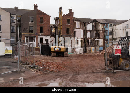 Blackpool,UK. 9th December 2014, With the demolition of Tyldesley road continuing some of the residents still occupy their homes whilst the destruction carries on around them. The regeneration and building of new homes is well underway Credit:  Gary Telford/Alamy live news Stock Photo