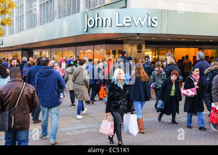 Shoppers outside John Lewis store on Oxford Street, London England United Kingdom UK