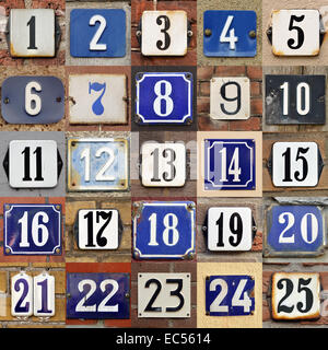 Collection of House numbers one to twenty-five Stock Photo