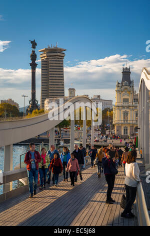 Pedestrians along the Rambla de Mar bridge in the Port Vell, Barcelona, Catalonia, Spain Stock Photo