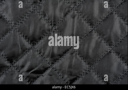 Black quilted cloth texture abstract Stock Photo