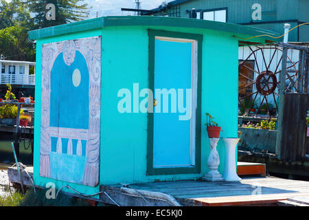 Green and blue little houseboat in Sausalito, California Stock Photo