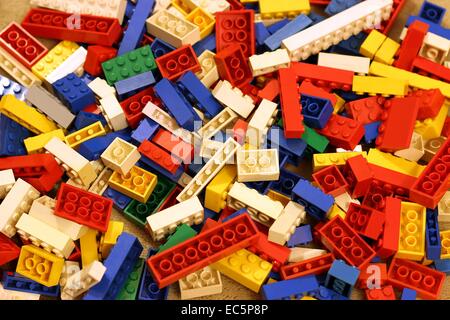Lego pieces on carpet Stock Photo