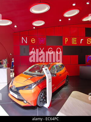 GENEVA - MARCH 13 : orange Aygo Toyota on display at the 84th International Motor Show Palexpo - Geneva on March 13, 2014 in Gen Stock Photo