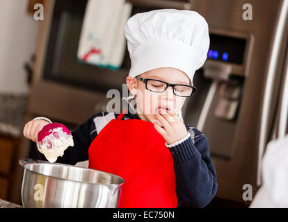 Making cookies with family for Christmas. Stock Photo