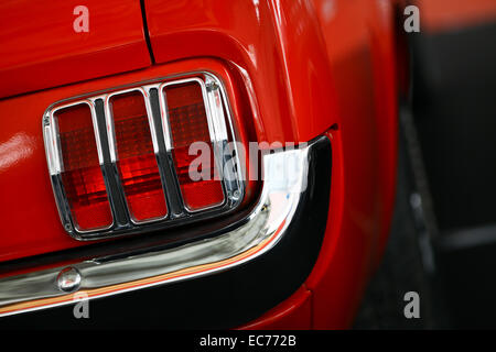 Detail on the rear light of a vintage car. Stock Photo