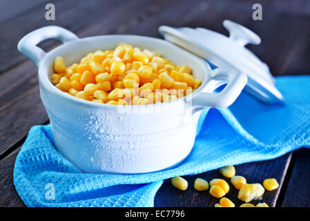 sweet corn in bowl and on a table Stock Photo