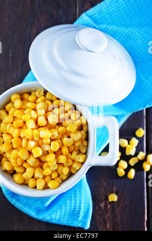 sweet corn in bowl and on a table Stock Photo