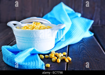 sweet corn in bowl and on a table Stock Photo