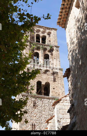 The Lombard church tower of the Moustiers St Marie church, in the Haute Provence Alps. Le clocher de l'église de Moustiers. Stock Photo