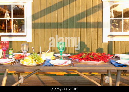 Sweden - Crayfish with dill eaten at traditional swedish crayfish party. Stock Photo