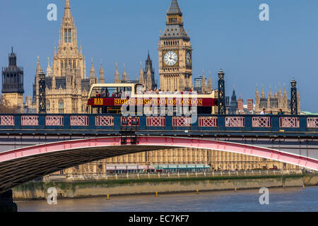 The Houses Of Parliament and A London Tour Bus Crossing Lambeth Bridge, London, England