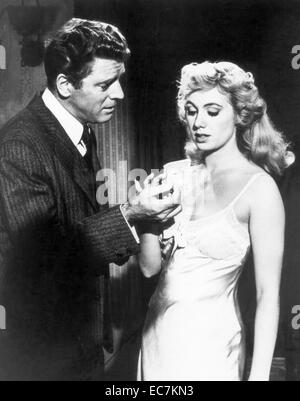 Elmer Gantry is a 1960 drama film about a con man and a female evangelist selling religion to small town America. Adapted by director Richard Brooks, the film is based on the 1927 novel of the same name by Sinclair Lewis and stars Burt Lancaster, Jean Simmons, Arthur Kennedy and Shirley Jones Stock Photo