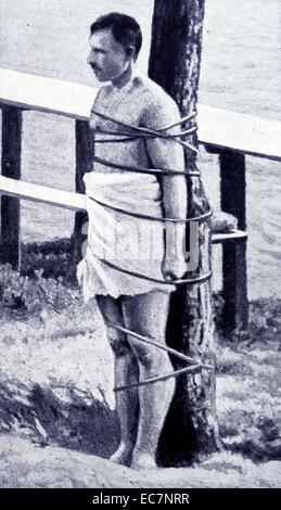 Russian soldier captured and prepared for execution by German guards at Lamsdorf camp in Silesia, during Wolrd War one Stock Photo