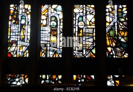 stained glass windows designed by john Piper depict the light of god, at the New St Michael's Cathedral, Coventry. Stock Photo