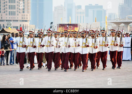 Qatar Emiri Guards are performing military marches on Qatar National Day. Stock Photo