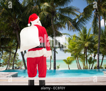 man in costume of santa claus with bag Stock Photo