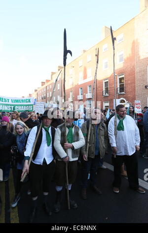 Dublin, Ireland. 10th December, 2014. Protestors dressed as pikemen. Image from a large anti-water charges protest in Dublin city centre. Thousands of people take part in the Right2Water march through the Irish capital. Credit:  Brendan Donnelly/Alamy Live News Stock Photo