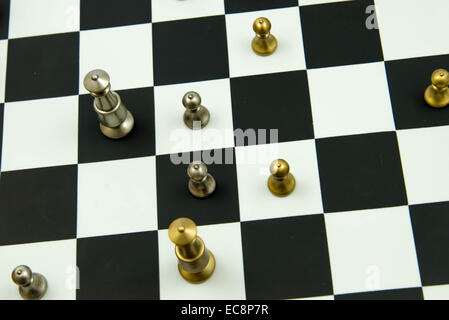 Classic chess game - pieces in play on chessboard Stock Photo