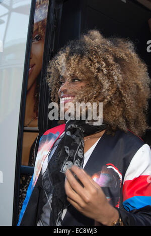 X Factor Homecoming for singer Fleur East. Fleur East, X Factor 2014 finalist, arrives on her Battle Bus at the MTV studios in Hawley Crescent, Camden Town. Stock Photo
