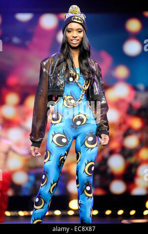 Model wearing a design by Alice Vandy during the Welcome to New York themed Fashion Theatre show, Clothes Show Live 2014, Birmingham NEC, UK. 9th December 2014. Credit:  Antony Nettle/Alamy Live News Stock Photo