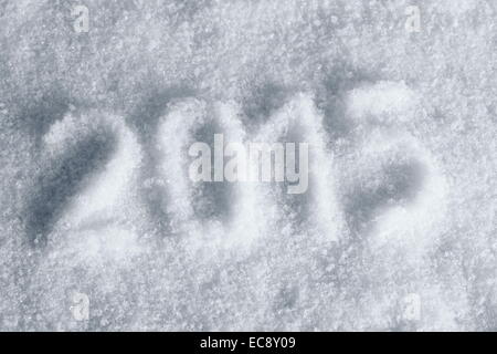 2015 draw stamp on snow, light blue tint, top view Stock Photo