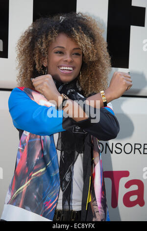X Factor Homecoming for singer Fleur East. Fleur East, X Factor 2014 finalist, arrives on her Battle Bus at the MTV studios in Hawley Crescent, Camden Town. Stock Photo