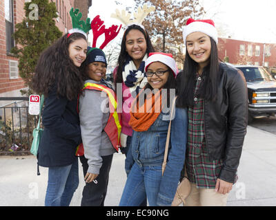 Local, Junior high school students at the Santa Jingle Bell Parade in the Greenpoint section of Brooklyn, NY, 2013. Stock Photo