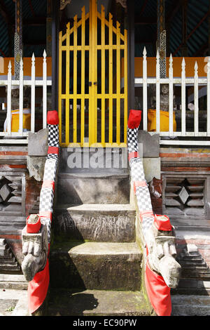 decorative door in Batur temple in Bali Indonesia prayer offering Stock Photo