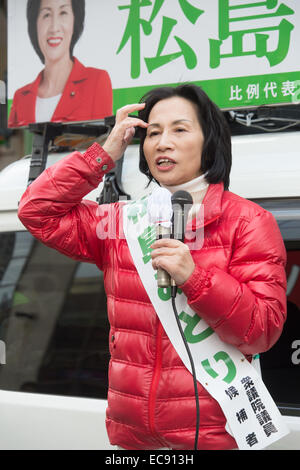 Tokyo, Japan. 10th Dec, 2014. Midori Matsushima, candidate of the ruling Liberal Democratic Party, speaks during a campaign for the December 14 lower house election in Tokyo on December 10, 2014. © AFLO/Alamy Live News Stock Photo