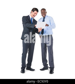 Cheerful Business Colleagues Discussing about the Documents Stock Photo