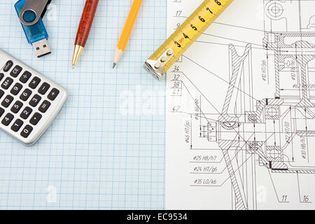 pen, pencil and memory flash stick on drafting Stock Photo