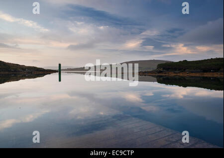 Peaceful and still early morning on Bantry Bay, County Cork, Ireland, with Bere Island in the background Stock Photo