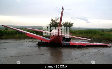 A Serbian registered Cesna aircraft crashed landed after it was forced to make an emergency landing due the strong winds and bad weather conditions. Three crew members have been reported injured and an investigation has been launched.  Featuring: Atmosphe Stock Photo