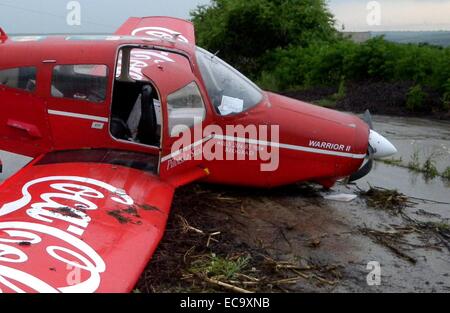 A Serbian registered Cesna aircraft crashed landed after it was forced to make an emergency landing due the strong winds and bad weather conditions. Three crew members have been reported injured and an investigation has been launched.  Featuring: Atmosphe Stock Photo