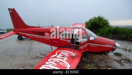 A Serbian registered Cesna aircraft crashed landed after it was forced to make an emergency landing due the strong winds and bad weather conditions. Three crew members have been reported injured and an investigation has been launched.  Featuring: Atmosphe Stock Photo