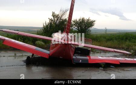 A Serbian registered Cesna aircraft crashed landed after it was forced to make an emergency landing due the strong winds and bad weather conditions. Three crew members have been reported injured and an investigation has been launched.  Featuring: Atmosphe Stock Photo