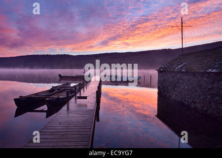Boat Jetty and Boathouse at Dawn on Coniston Water near Coniston Lake District Cumbria England Stock Photo