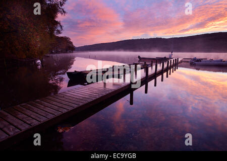 Autumn Dawn at a Boat Jetty on Coniston Water near Coniston Lake District Cumbria England Stock Photo