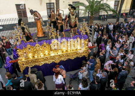 Processional Float A crowd of people, procession, a processional float (paso) during ...