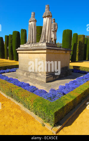 Statues of Queen Isabel, King Fernando and Christopher Columbus in the gardens of Alcázar de los Reyes Cristianos Stock Photo