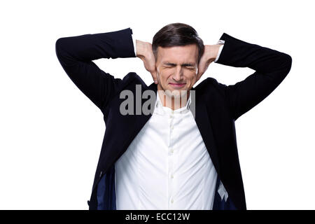 Businessman holding hands on the ears over white background Stock Photo